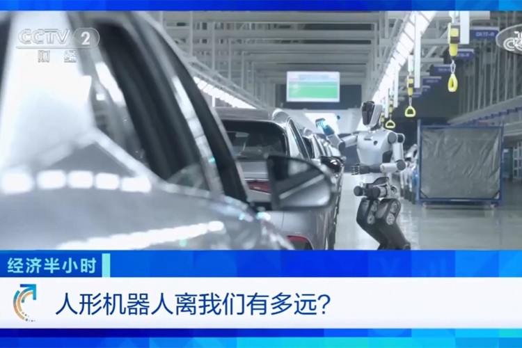 中央电视台《经济半小时》栏目对新浦金350vip机器人的专题报道